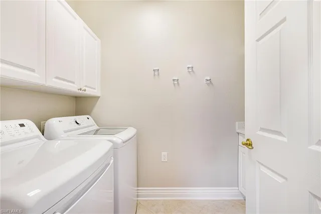 a view of a porch with a floor to ceiling window and garden