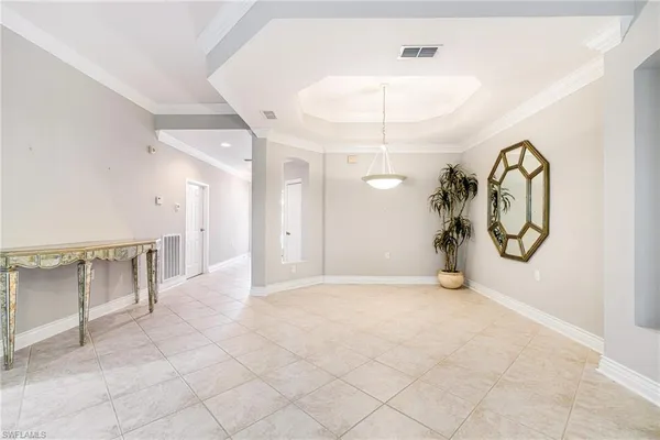 en view interior space with lots of white furniture