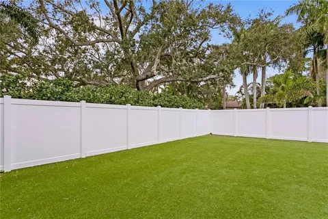 a view of a backyard with a small cabin
