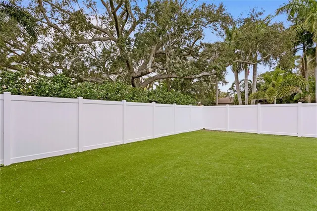 a view of a backyard with a small cabin