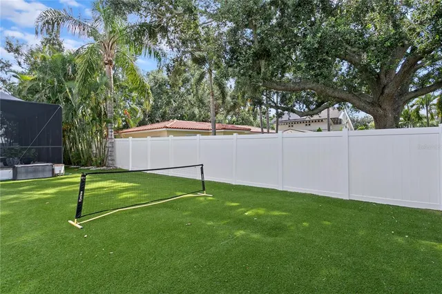 a bathroom with a sink double vanity and a mirror