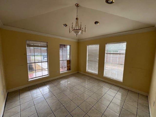 11209 Verano Street Houston, TX 77029 - Photo 3 of 12 a view of an empty room with window and chandelier fan