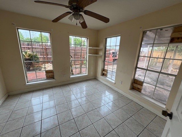 11209 Verano Street Houston, TX 77029 - Photo 10 of 12 wooden floor in an empty room with a window