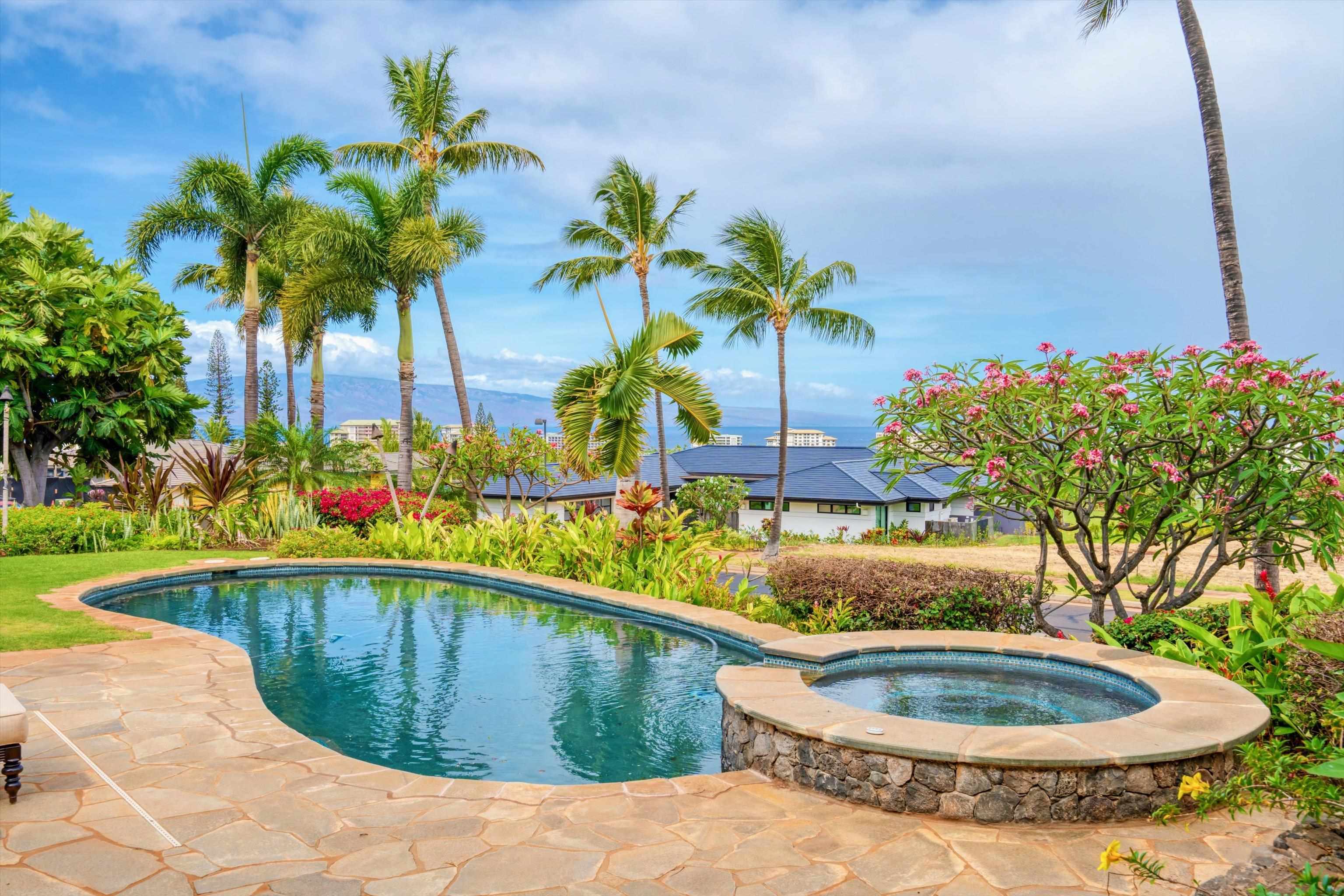 137 Anapuni Loop Lahaina, HI 96761 - Photo 9 of 19 a view of a swimming pool with a yard