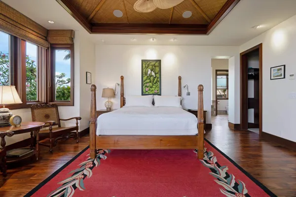 a bed room with a bed and a window