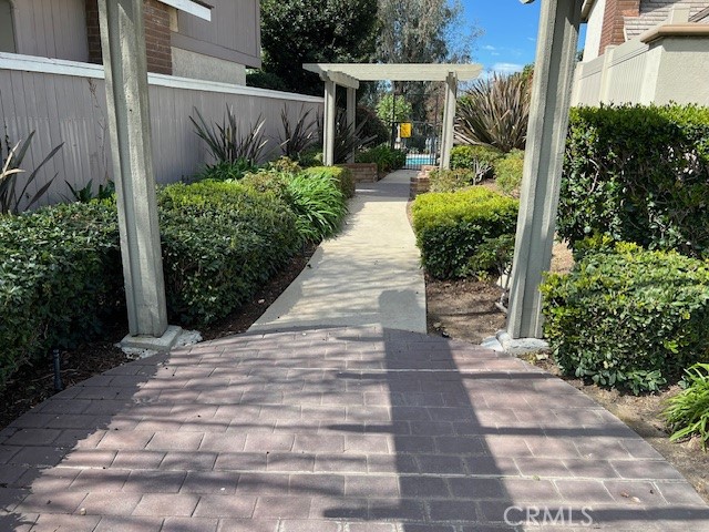704 Arroues Drive Fullerton, CA 92835 - Photo 12 of 13 a view of a garden with pathway