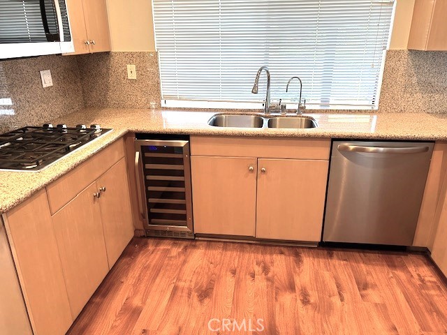 704 Arroues Drive Fullerton, CA 92835 - Photo 5 of 13 a kitchen with granite countertop a sink and cabinets