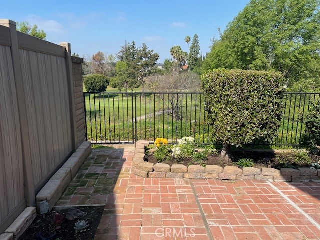 704 Arroues Drive Fullerton, CA 92835 - Photo 8 of 13 a view of a pathway with a garden