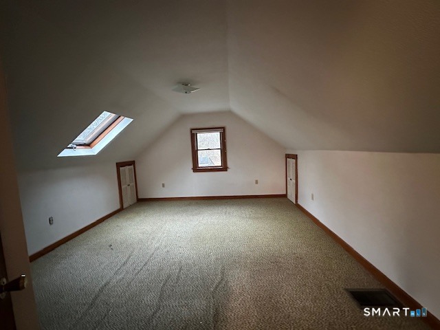 609 Water Street Canterbury, CT 06331 - Photo 19 of 27 an empty room with windows