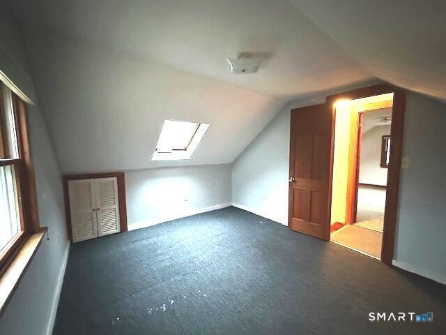 609 Water Street Canterbury, CT 06331 - Photo 21 of 27 an empty room with windows