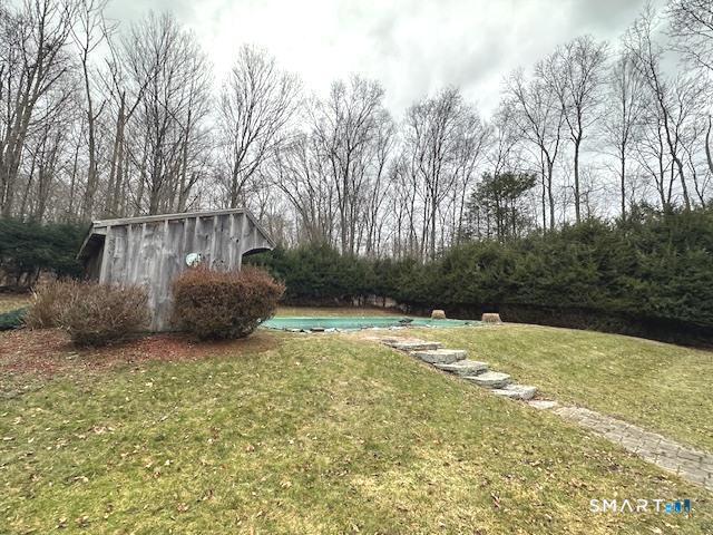 609 Water Street Canterbury, CT 06331 - Photo 25 of 27 a backyard of a house