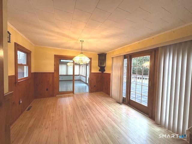 609 Water Street Canterbury, CT 06331 - Photo 6 of 27 a view of a room with wooden floor and a window