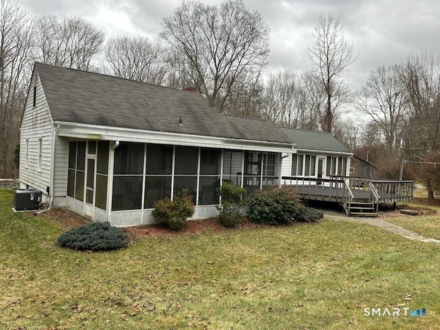 609 Water Street Canterbury, CT 06331 - Photo 9 of 27 a view of a house with a yard and sitting area