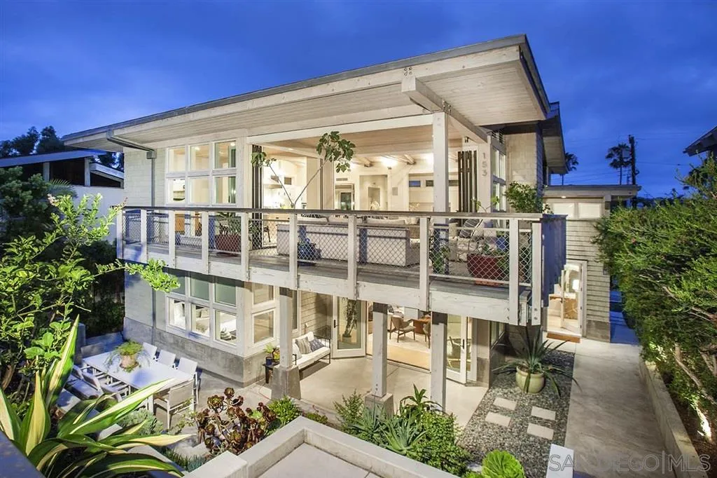 front view of house with outdoor seating