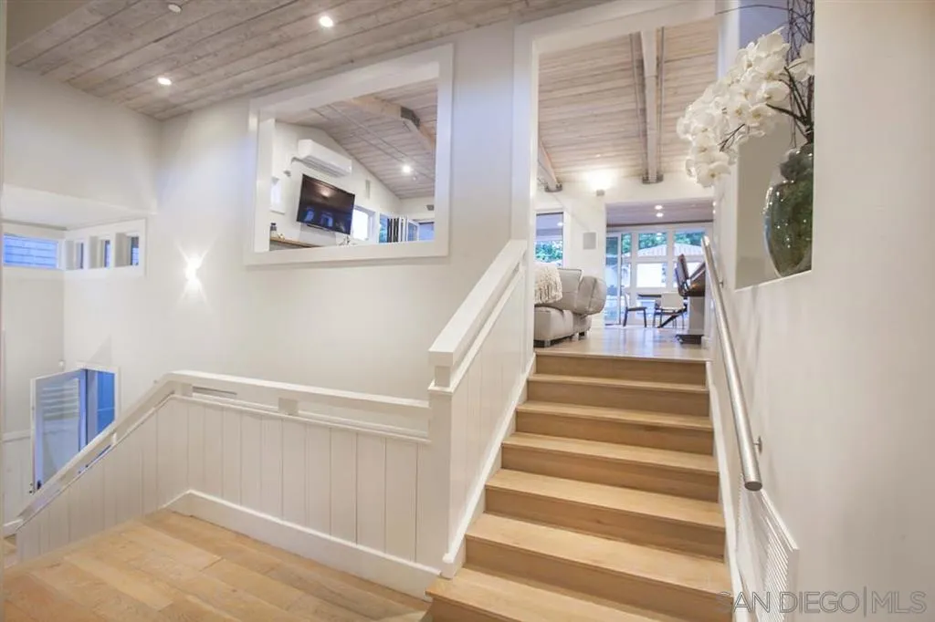 153 5th Street Encinitas, CA 92024 - Photo 16 of 25 a view of entryway and hall with wooden floor