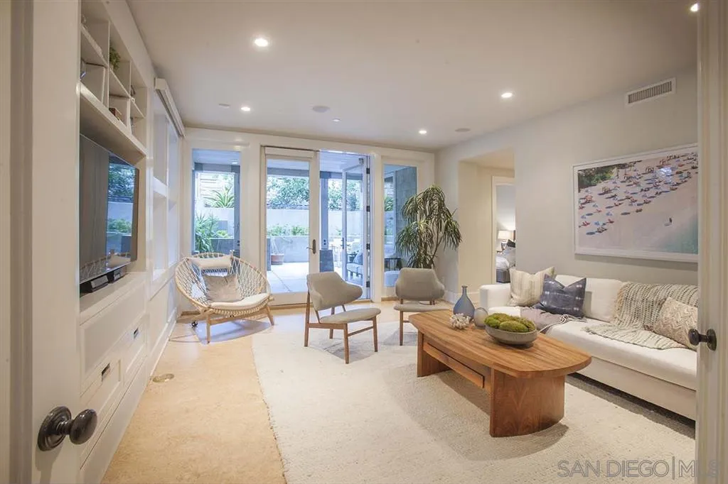153 5th Street Encinitas, CA 92024 - Photo 17 of 25 a living room with furniture and a flat screen tv