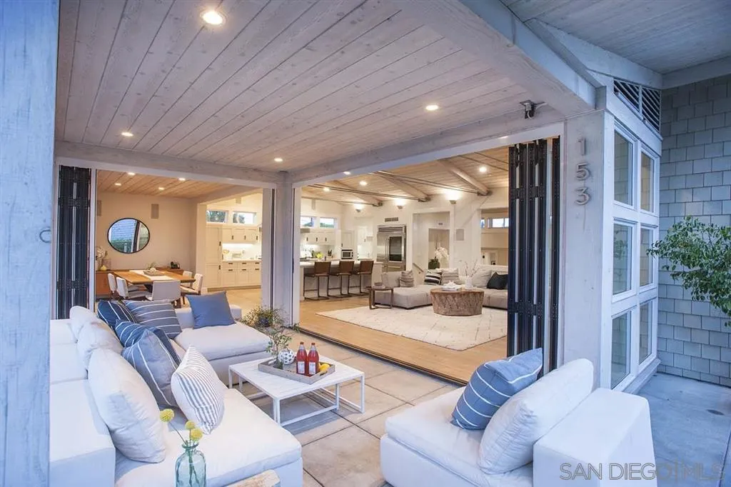 153 5th Street Encinitas, CA 92024 - Photo 5 of 25 a living room with furniture and a large window