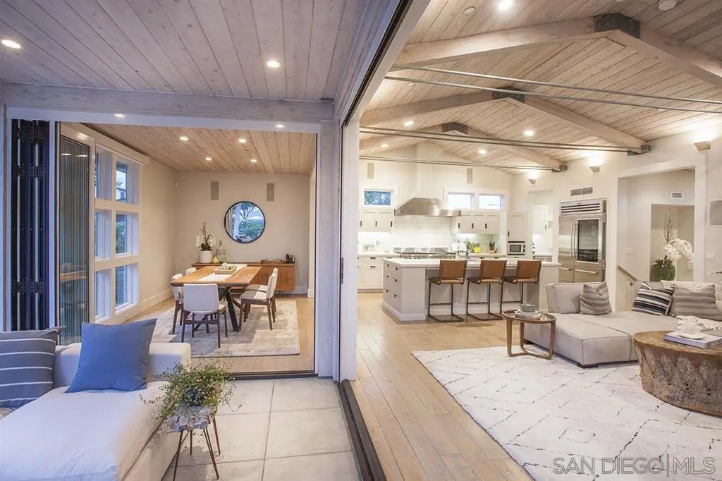 153 5th Street Encinitas, CA 92024 - Photo 7 of 25 a living room with furniture and a large window
