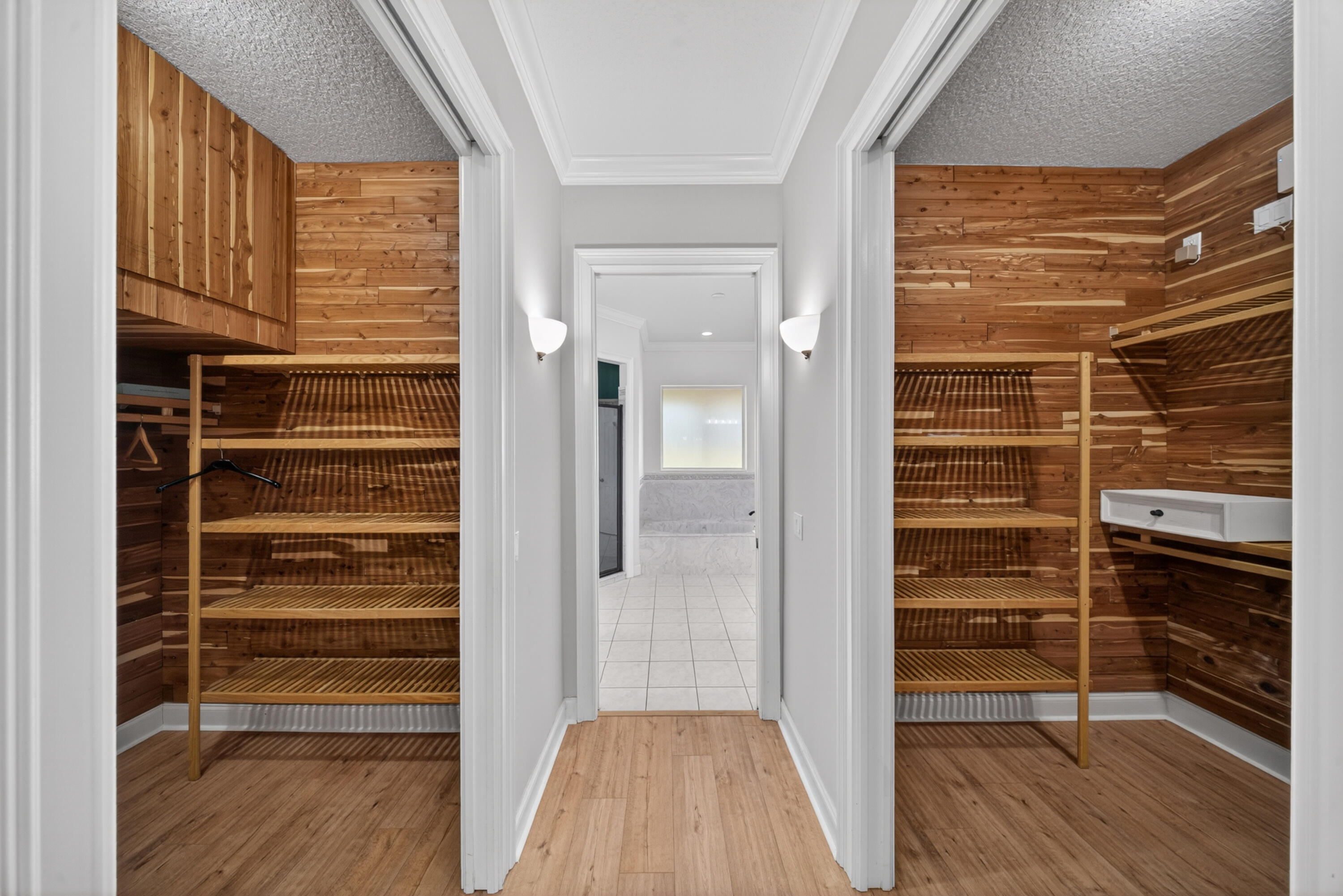 8686 Andrews Avenue Fort Pierce, FL 34945 - Photo 24 of 76 a view of walk in closet with empty racks