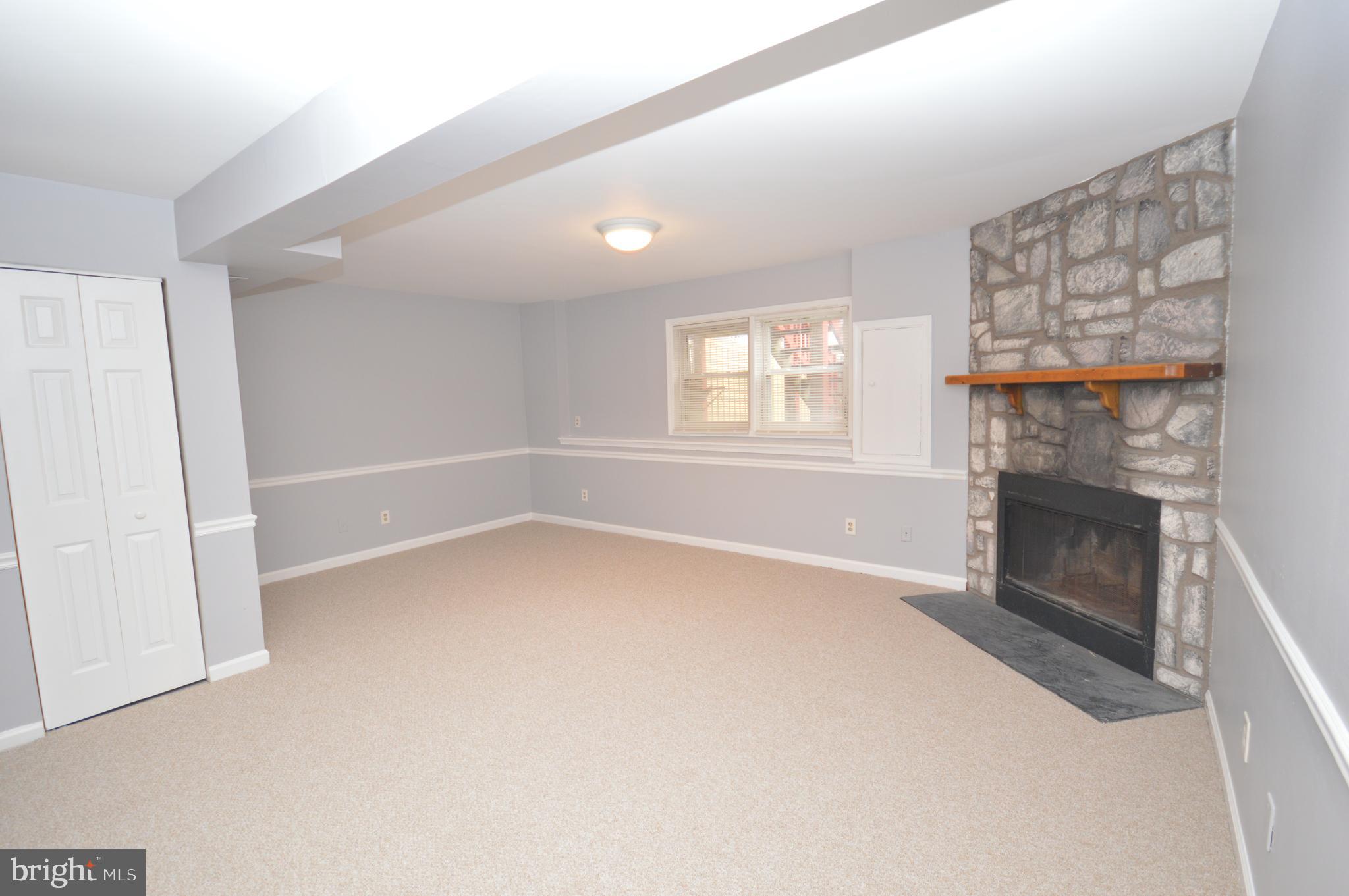 102 Harrogate Road Fredericksburg, VA 22406 - Photo 38 of 41 Basement with wood burning fireplace