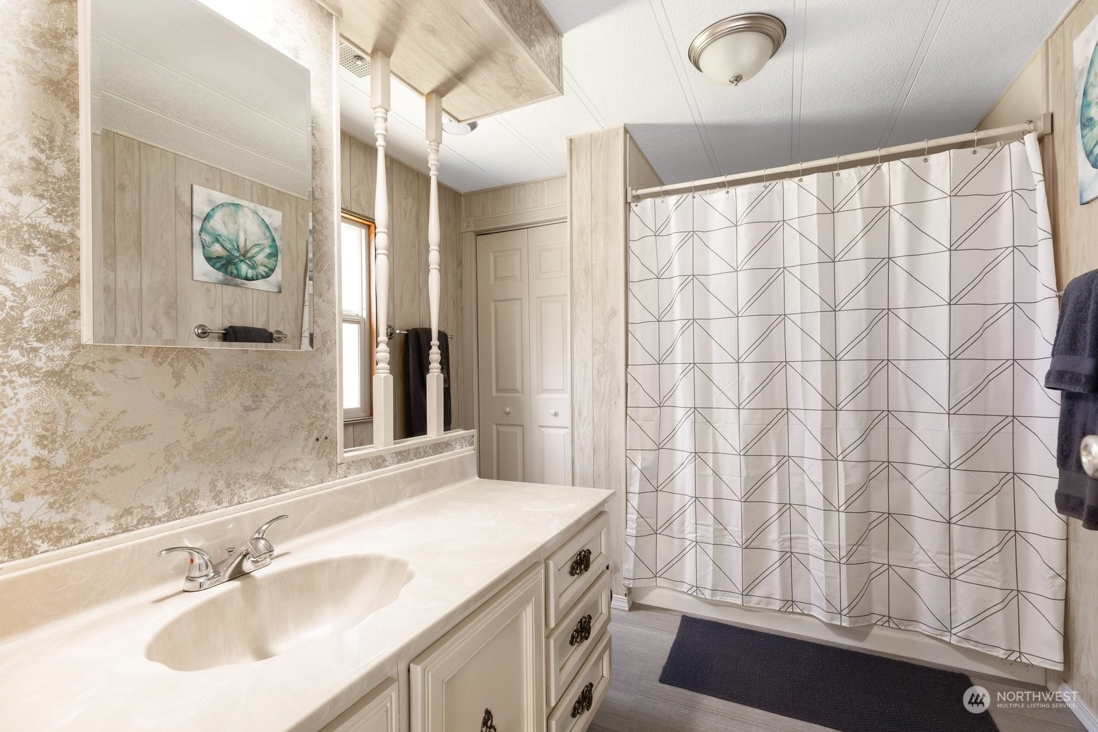 1742 Harns Road Oak Harbor, WA 98277 - Photo 18 of 37 a bathroom with a sink and a mirror