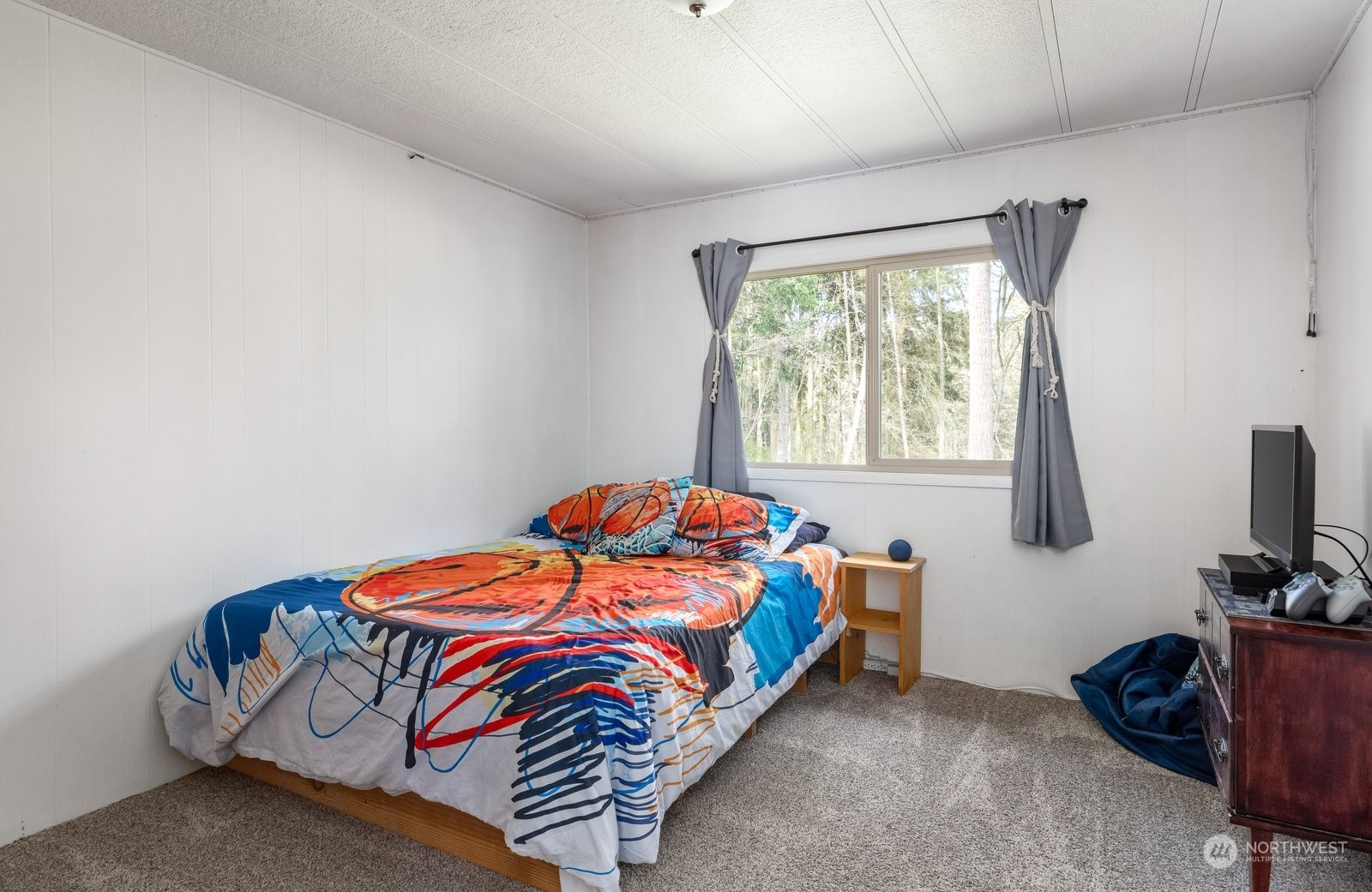 1742 Harns Road Oak Harbor, WA 98277 - Photo 21 of 37 a bedroom with a bed and a window