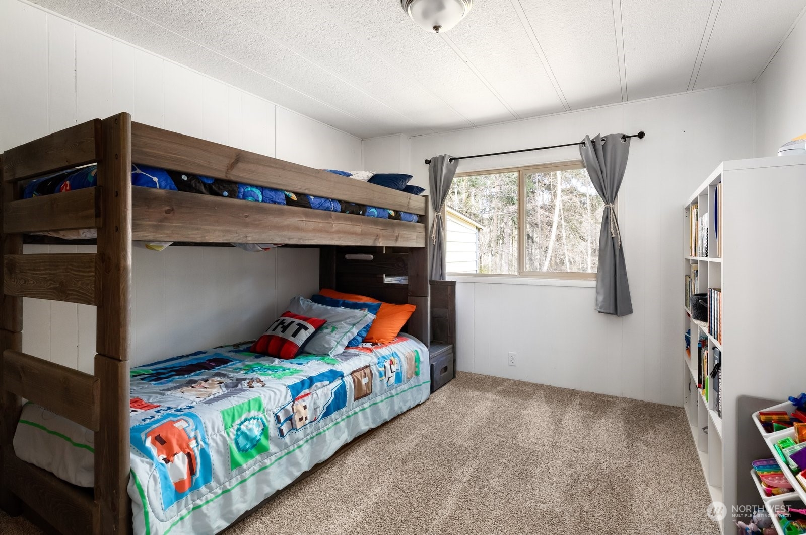 1742 Harns Road Oak Harbor, WA 98277 - Photo 23 of 37 a bedroom with a bed and a window