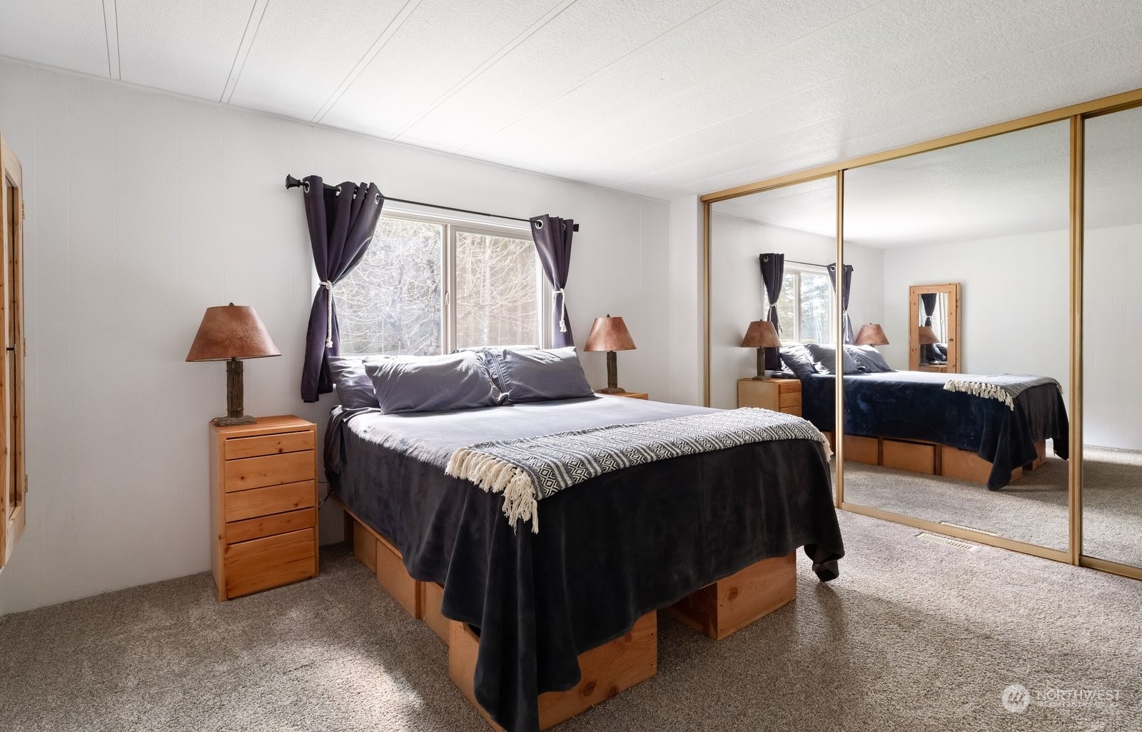 1742 Harns Road Oak Harbor, WA 98277 - Photo 25 of 37 a bedroom with a bed and a dresser