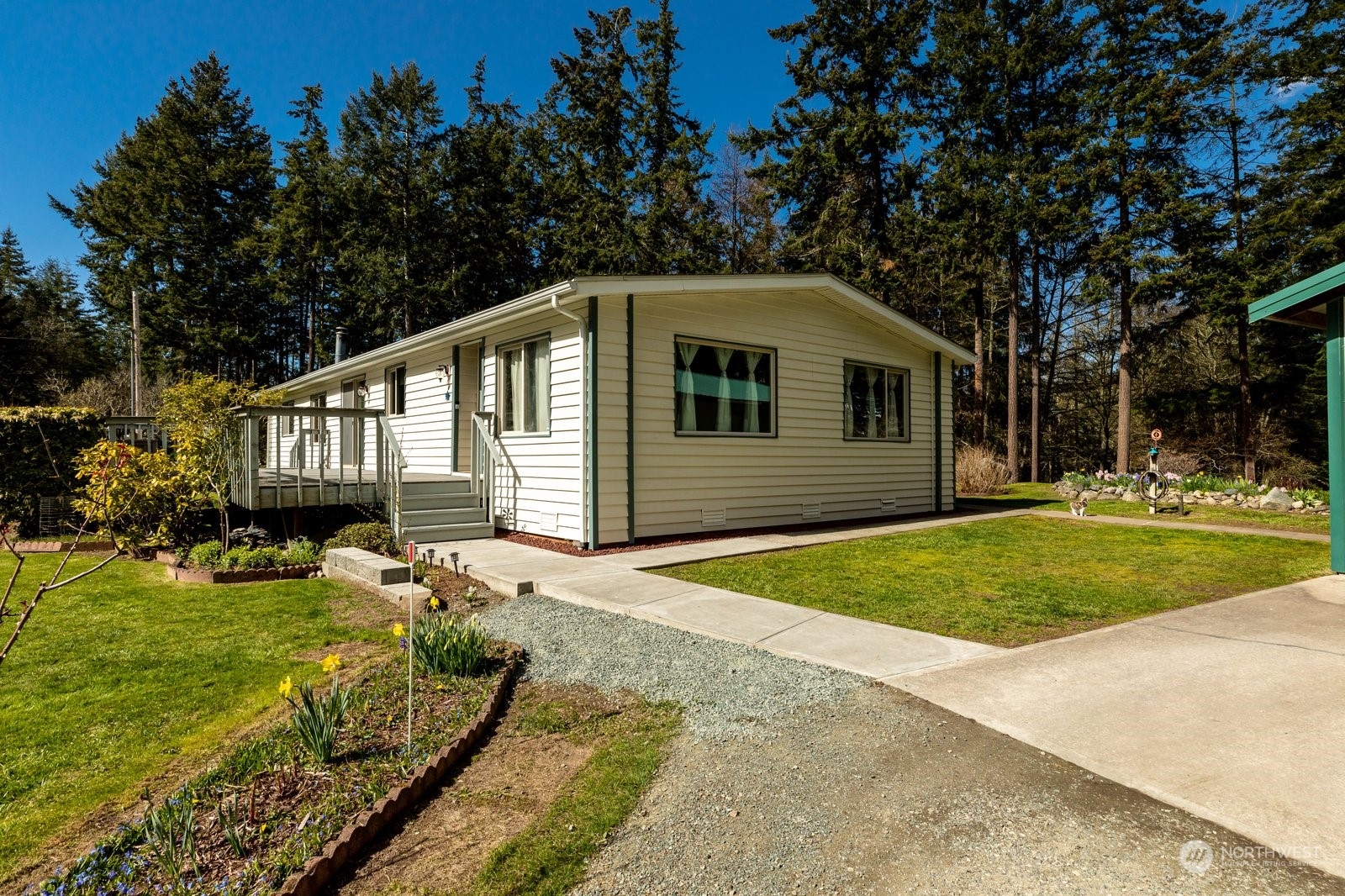 1742 Harns Road Oak Harbor, WA 98277 - Photo 35 of 37 a front view of a house with a garden