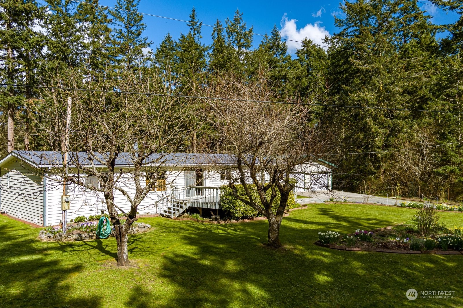1742 Harns Road Oak Harbor, WA 98277 - Photo 36 of 37 a view of a house with a yard
