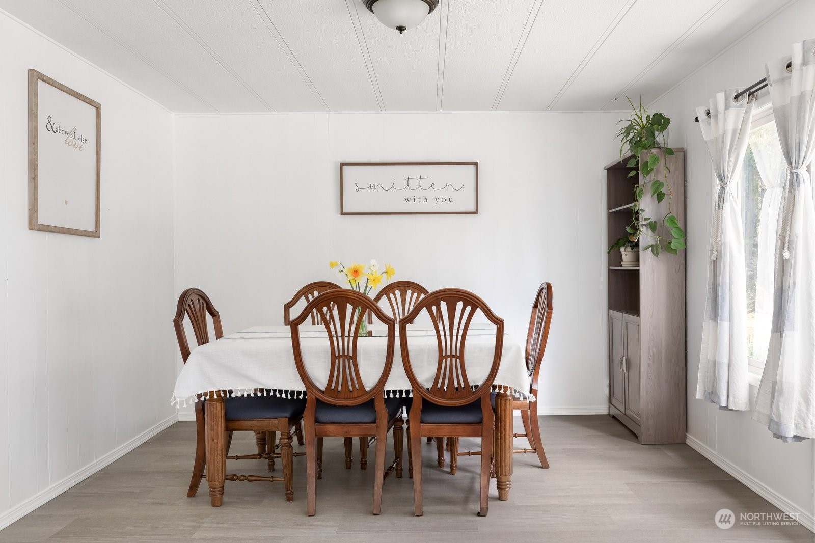 1742 Harns Road Oak Harbor, WA 98277 - Photo 7 of 37 a dining room with furniture and window