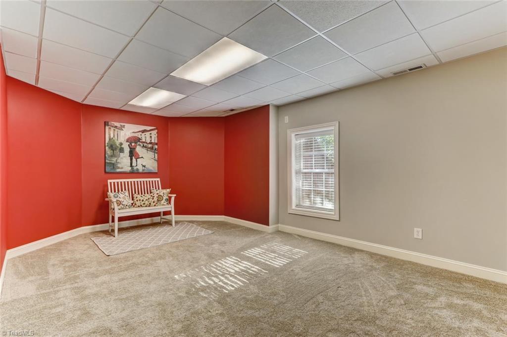 4905 Leadenhall Road Oak Ridge, NC 27310 - Photo 23 of 30 Another multipurpose/game room down stairs.