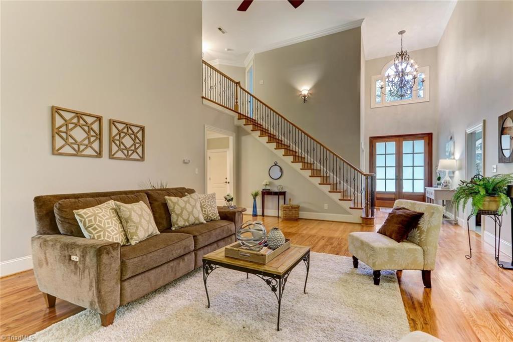4905 Leadenhall Road Oak Ridge, NC 27310 - Photo 5 of 30 Open plan living!!! Gleaming hardwood floors and recently painted interior.