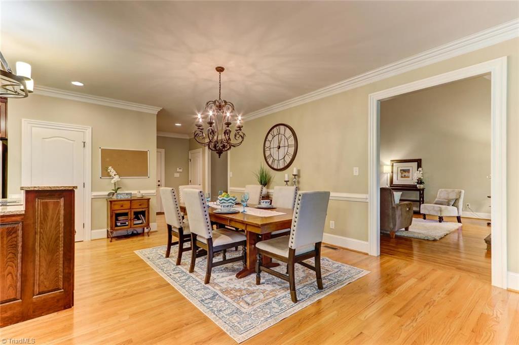 4905 Leadenhall Road Oak Ridge, NC 27310 - Photo 6 of 30 Roomy dining area is open to kitchen and keeping room.