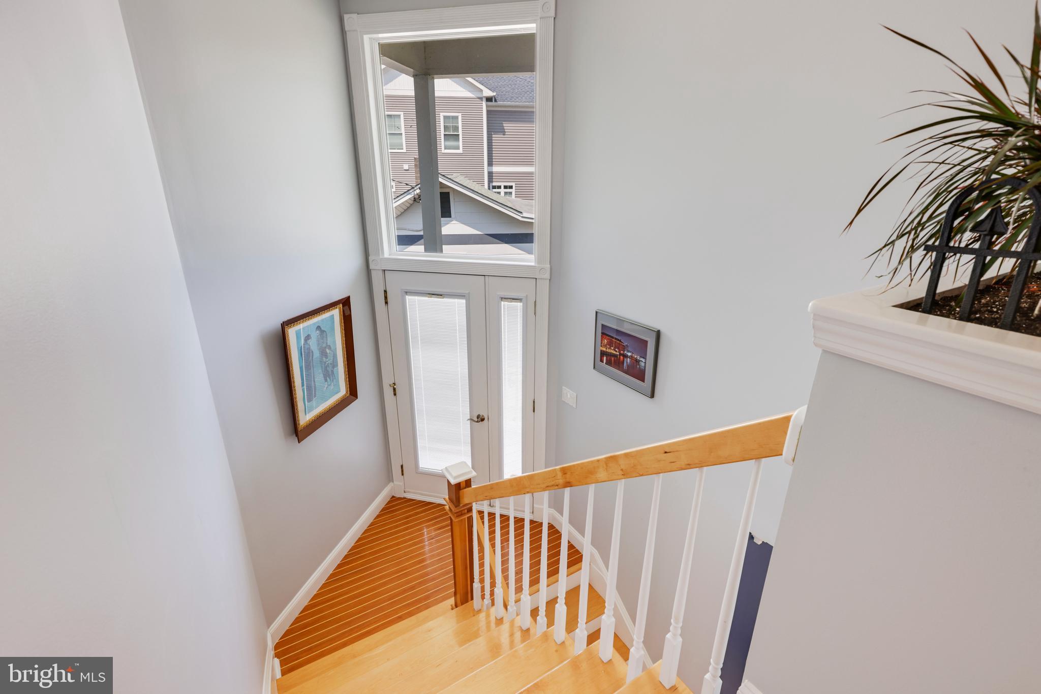 2334 Poplar Road Baltimore, MD 21221 - Photo 25 of 80 Teakwood staircase leading to upper level