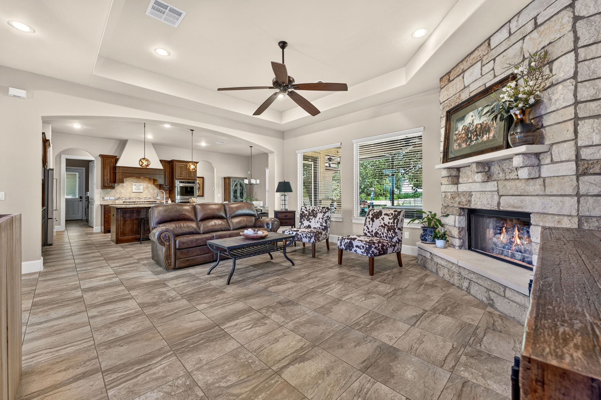 105 Coopers Hill Road Georgetown, TX 78633 - Photo 13 of 40 a living room with furniture and a fireplace