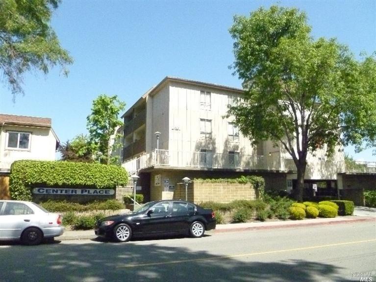 1540 Center Road, Unit 155 Novato, CA 94947 - Photo 1 of 1 a car parked in front of a house