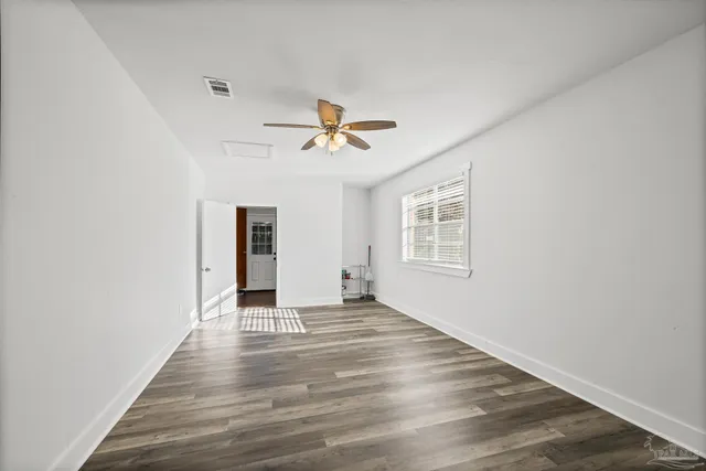 a view of bathroom with a toilet and a shower
