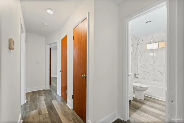 a bathroom with a sink a toilet and a bathtub