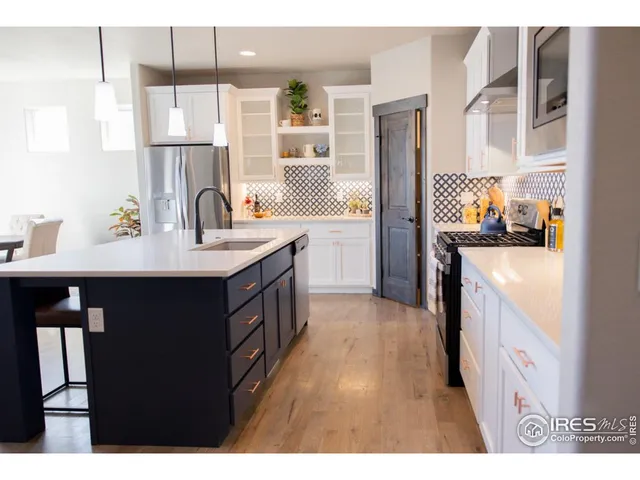 $715,000 | 2009 Reliance Drive, Windsor, CO 80550