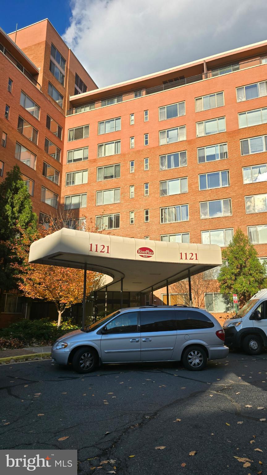 1121 Arlington Boulevard, Unit 801 Arlington, VA 22209 - Photo 1 of 14 a car parked in front of a building