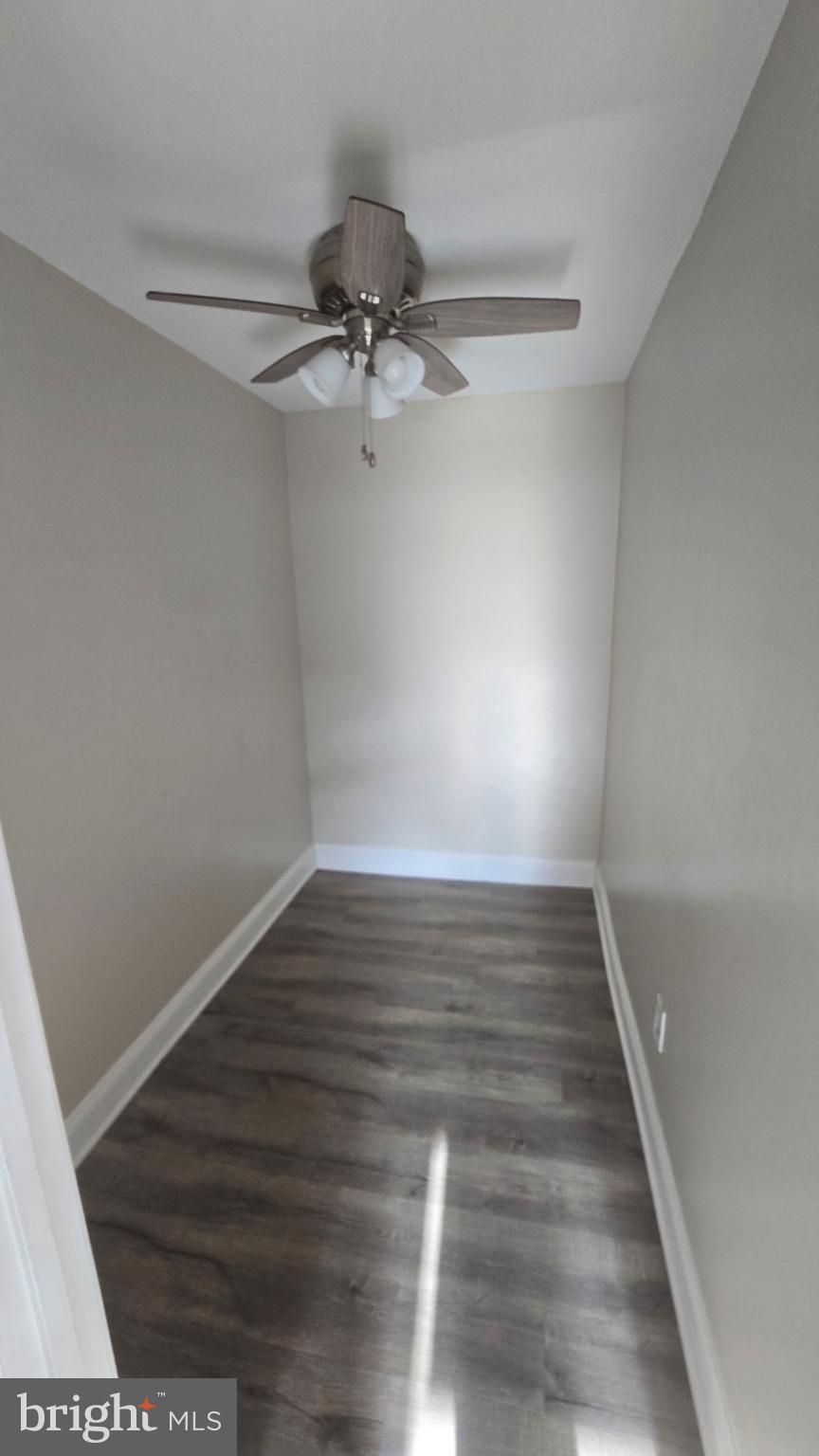 1121 Arlington Boulevard, Unit 801 Arlington, VA 22209 - Photo 9 of 14 a view of room with hardwood floor and ceiling fan