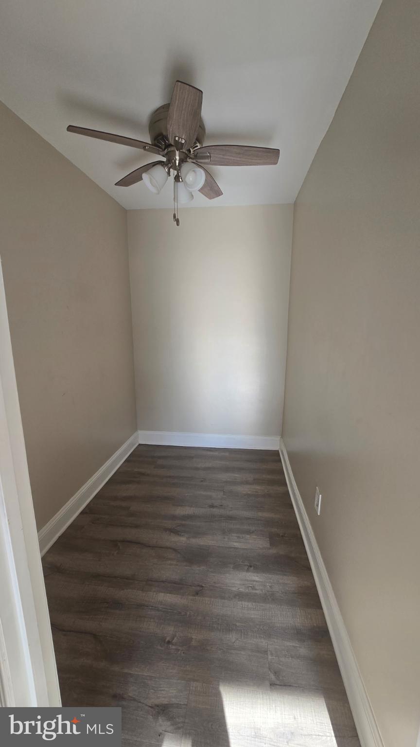 1121 Arlington Boulevard, Unit 801 Arlington, VA 22209 - Photo 10 of 14 a view of a room with wooden floor and staircase