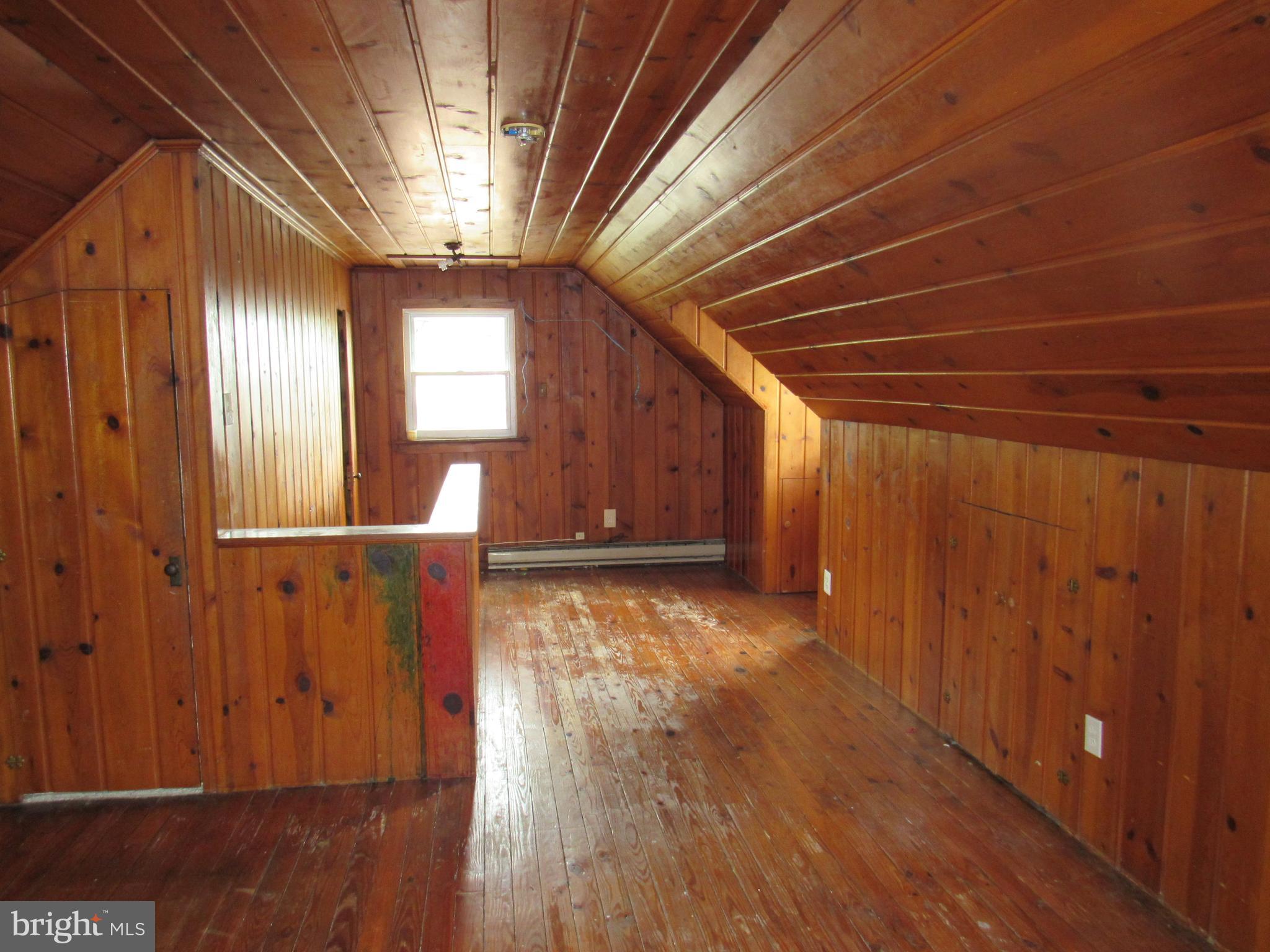 11512 Veirs Mill Road Silver Spring, MD 20902 - Photo 12 of 14 Large attic space ready for renovation.