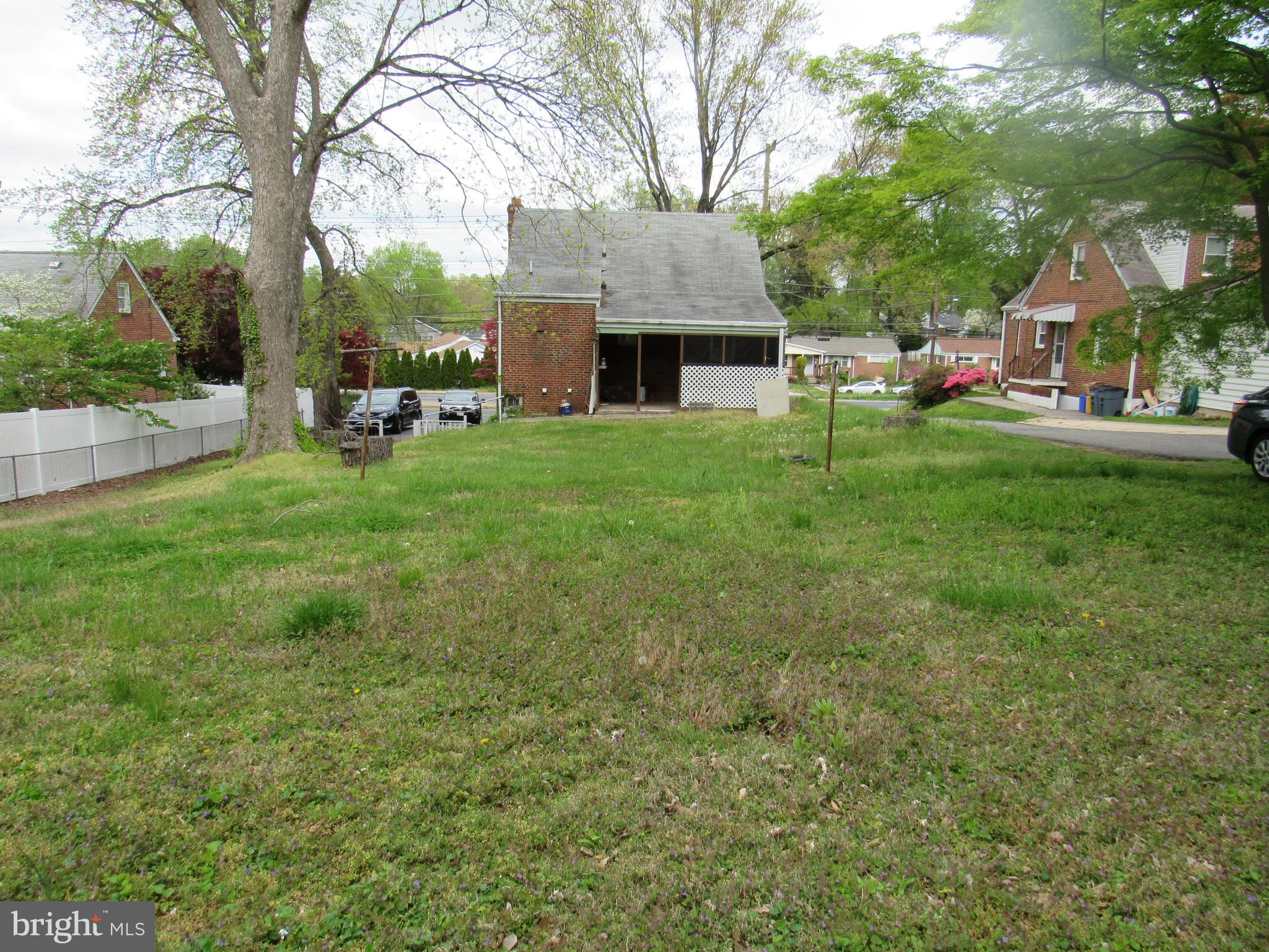 11512 Veirs Mill Road Silver Spring, MD 20902 - Photo 5 of 14 Giant backyard ready for an addition.