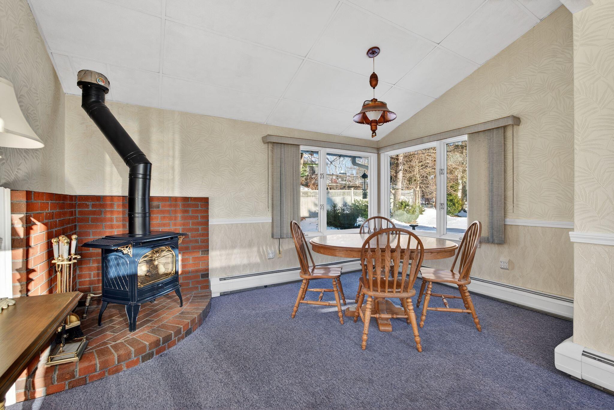 67 Maple Avenue Scarborough, ME 04074 - Photo 17 of 38 sunroom with gas fireplace