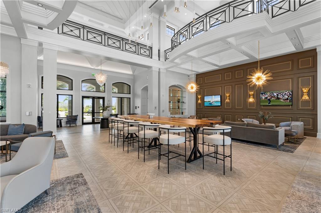 2104 Freemont Way Naples, FL 34119 - Photo 24 of 27 Grand foyer at clubhouse