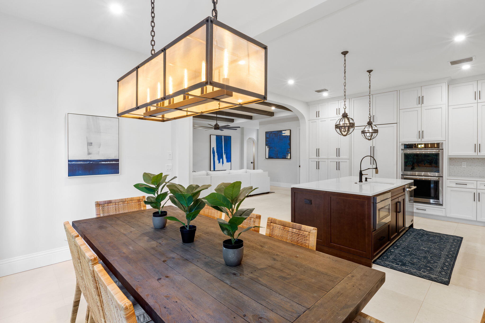 249 Edmor Road West Palm Beach, FL 33405 - Photo 12 of 49 a kitchen with a table and chairs in it