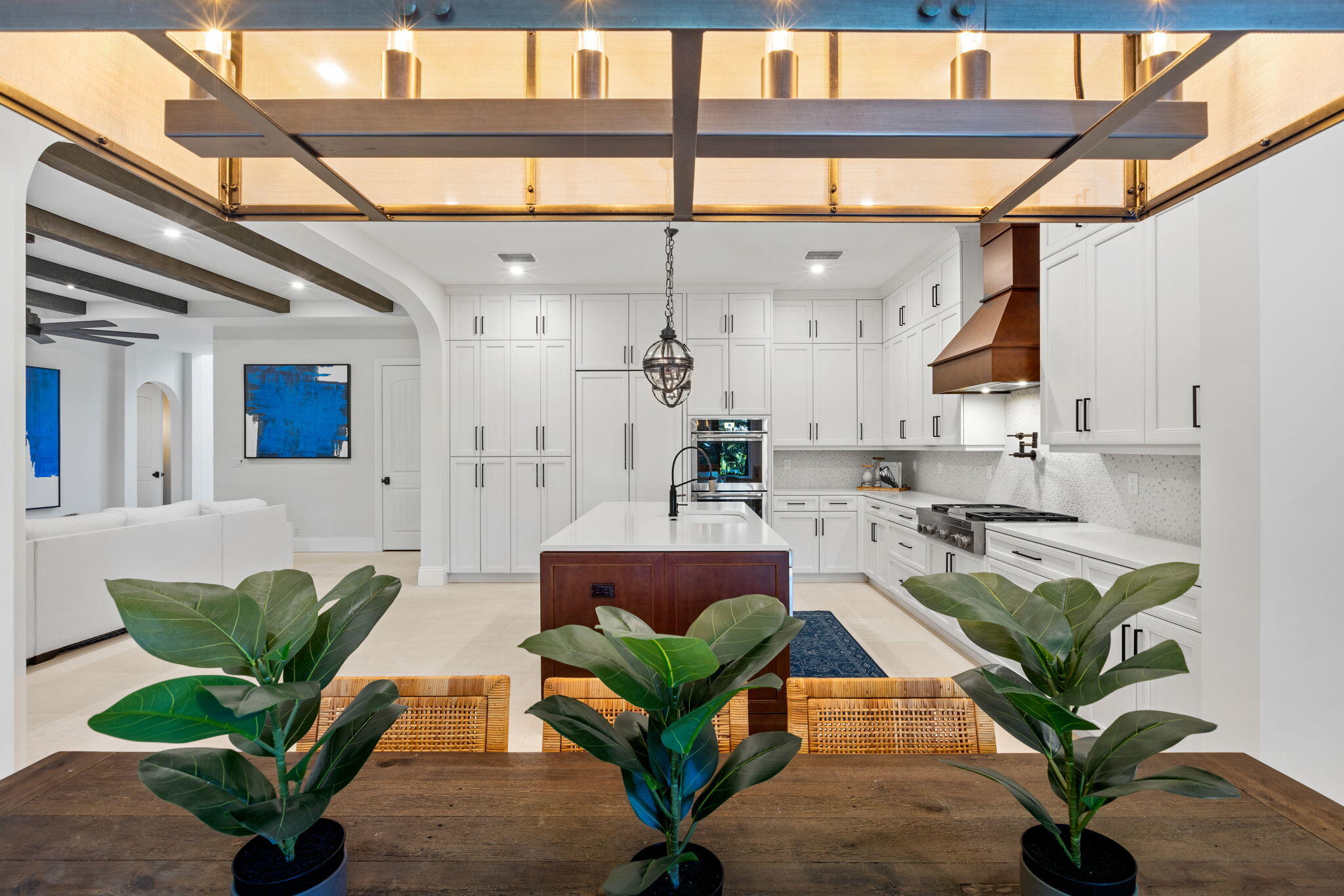 249 Edmor Road West Palm Beach, FL 33405 - Photo 15 of 49 a living room with furniture a potted plant and a large window