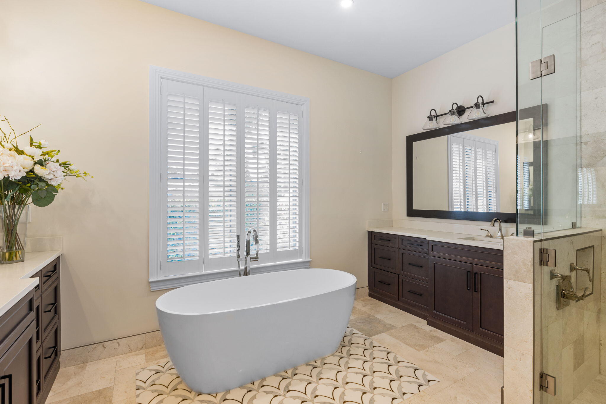 249 Edmor Road West Palm Beach, FL 33405 - Photo 20 of 49 a spacious bathroom with a tub sink and mirror